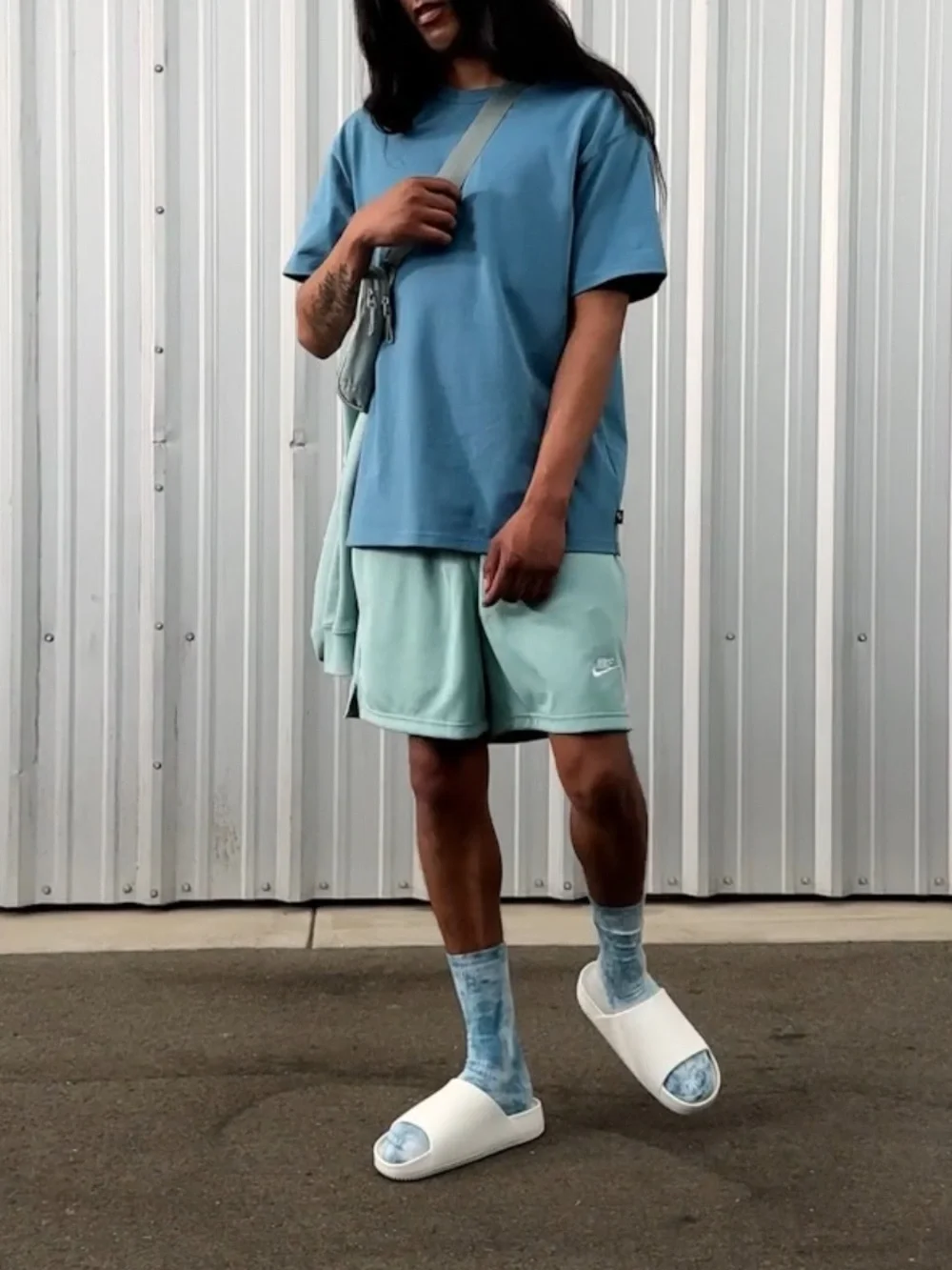 Nike Calm White Slide Sandals.